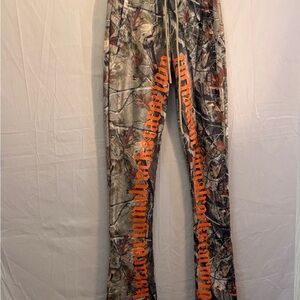Rockstar Camouflage Pants with Orange Lettering